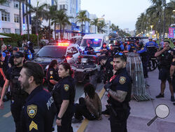 FILE - City of Miami Beach police officers respond to an incident during spring break, March 15, 2024, in Miami Beach, Fla. (AP Photo/Rebecca Blackwell, File)