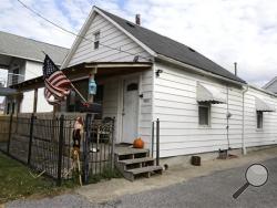 A Thursday, Nov. 5, 2015 photo shows the house where Julian Hernandez lived with his father, Bobby, in Cleveland. Thirteen years after Julian was allegedly snatched from his Alabama home at age 5 by his father, the young man has been found living under an assumed name with his dad in Ohio, in a case authorities say broke open when his Social Security number raised red flags during college applications. (AP Photo/Tony Dejak)