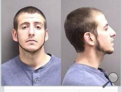 This cellphone screenshot provided by Aaron Pursell of Great Falls/Cascade County Crimestoppers, shows the Cascade County, Mont., jail booking mugshots of Levi Charles Reardon, posted on the Crimestoppers Facebook page.