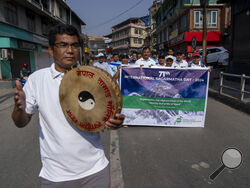 People from the mountaineering community participate in a rally to mark the anniversary of the first ascent of Mount Everest in Kathmandu, Nepal, Wednesday, May 29, 2024. (AP Photo/Niranjan Shrestha)