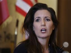 This June 15, 2016, file photo shows Oakland Mayor Libby Schaaf answering questions during a news conference at City Hall in Oakland, Calif. Another Oakland police chief has stepped down after two days on the job. (AP Photo/Eric Risberg, File)