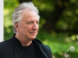 In this Tuesday, June 9, 2015 file photo, actor Alan Rickman attends The Public Theater's Annual Gala at the Delacorte Theater in Central Park, in New York. British actor Alan Rickman, whose career ranged from Britain’s Royal Shakespeare Company to the “Harry Potter” films, has died. He was 69. Rickman’s family said Thursday, Jan. 14, 2016 that the actor had died after a battle with cancer. (Photo by Charles Sykes/Invision/AP, File) 