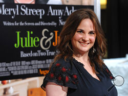 FILE - Author Julie Powell attends the premiere of "Julie & Julia" at The Ziegfeld Theatre, in New York, on July 30, 2009. Powell, who became an internet darling after blogging for a year about making every recipe in Julia Child’s “Mastering the Art of French Cooking,” leading to a book deal and a film adaptation, died of cardiac arrest on Oct. 26, 2022, at her home in upstate New York. She was 49. (AP Photo/Peter Kramer, File)
