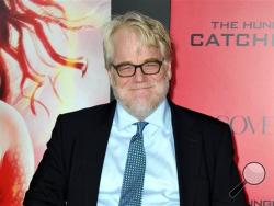Philip Seymour Hoffman at the Los Angeles premiere of "The Hunger Games: Catching Fire" at Nokia Theatre LA Live. Police say Oscar-winning actor Philip Seymour Hoffman was found dead in his New York City apartment Sunday, Feb. 2, 2014. He was 46. (Photo by Jordan Strauss/Invision/AP, File)