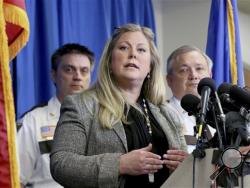 Martha Weaver, spokesperson for the Midwest Medical Examiner's Officer, answers a question as Carver County Sheriff Jim Olson, right, and Jim Kamerud chief deputy, listen in during a press conference on circumstances surrounding the death of music icon Prince Rogers Nelson at the Carver County Justice Center Friday, April 22, 2016, in Chaska, Minn.(David Joles/Star Tribune via AP)