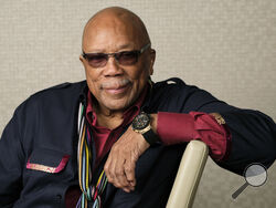 FILE - Music producer Quincy Jones poses for a portrait to promote his documentary "Quincy" during the Toronto Film Festival on Sept. 7, 2018, in Toronto. (Photo by Chris Pizzello/Invision/AP, File)