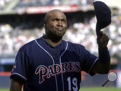 In this Oct. 7, 2001 file photo, San Diego Padres' Tony Gwynn fights back tears as he acknowledges the standing ovation prior to the Padres' game against the Colorado Rockies, the final game of his career, in San Diego. The Baseball Hall of Fame said Gwynn died of cancer on Monday, June 16, 2014. He was 54. (AP Photo)