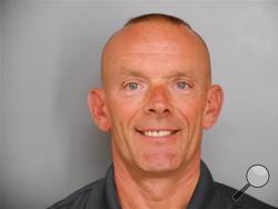 This undated file photo provided by the Fox Lake Police Department shows Lt. Charles Joseph Gliniewicz. Authorities will announce Wednesday, Nov. 4, 2015, that the northern Illinois police officer whose shooting death led to a massive manhunt in September killed himself, an official briefed on the crime investigation says. (Fox Lake Police Department photo via AP, File)