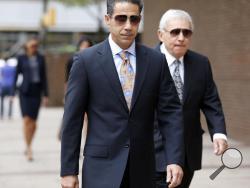 In this Oct. 10, 2014 file photo, Joey Merlino arrives at the federal court in Philadelphia. The flamboyant alleged head of the Philadelphia mob who has repeatedly beat murder charges in past cases is among nearly four dozen people Thursday, Aug. 4, 2016, with being part of an East Coast crime syndicate. (Yong Kim/Philadelphia Daily News via AP, File)