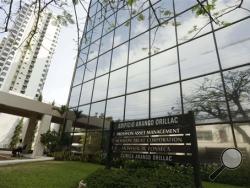 A marquee of the Arango Orillac Building lists the Mossack Fonseca law firm in Panama City, Sunday, April 3, 2016. (AP Photo/Arnulfo Franco)