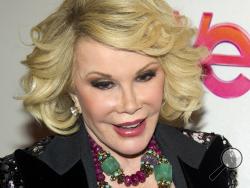 In this Jan. 19, 2012, file photo, Joan Rivers attends a screening of the Season 2 premiere of WE TV's "Joan & Melissa: Joan Knows Best?" in New York. (AP Photo/Charles Sykes, File)