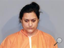 Connie Villa, 35, was arrested Dec. 28 on suspicion of one count of first-degree murder and four counts of attempted murder on Christmas Day in Casa Grande, Ariz. Villa, from Arizona is accused of trying to poison her four children, including one who died, and of stabbing her former husband. (AP Photo/Casa Grande Police Department)