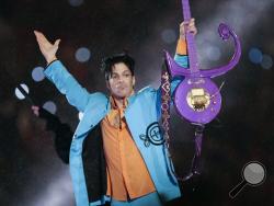 In this Feb. 4, 2007 file photo, Prince performs during halftime of the Super Bowl XLI football game in Miami. (AP Photo/Chris O'Meara, File)