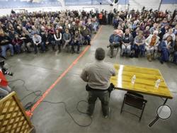 Harney County Sheriff David Ward listens to concerns during a community meeting at the Harney County fairgrounds on Wednesday, Jan. 6, 2016, in Burns, Ore. (AP Photo/Rick Bowmer)