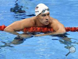 In this Aug. 9, 2016, file photo, United States' Ryan Lochte checks his time after a men' 4x200-meter freestyle relay heat during the swimming competitions at the 2016 Summer Olympics in Rio de Janeiro, Brazil. A Brazilian police official told The Associated Press that Lochte fabricated a story about being robbed at gunpoint in Rio de Janeiro. (AP Photo/Martin Meissner, File)