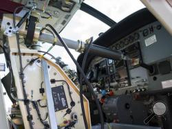 Aurora Flight Sciences' Aircrew Labor In-Cockpit Automantion System (ALIAS), is mounted in the co-pilot seat of a Cessena Caravan aircraft at Manassas Airport in Manassas, Va., Monday, Oct. 17, 2016. Government and industry are working together on a robot-like autopilot system that could eliminate the need for a second human pilot in the cockpit. (AP Photo/Cliff Owen)