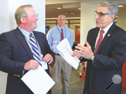 Congressman Lou Barletta, right, talks with Central Columbia superintendent Harry Mathias about the school’s Career Pathway Program during a May visit to the district’s high school by the congressman.