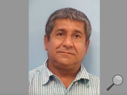 This photo released Tuesday, Aug. 9, 2022, by the Albuquerque Police Department shows Muhammad Syed. Syed, 51, was taken into custody Monday, Aug. 8, 2022, in connection with the killings of four Muslim men in Albuquerque, New Mexico, over the last nine months. He faces charges in two of the deaths and may be charged in the others. (Albuquerque Police Department via AP)