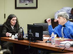 FILE - In this June 20, 2018, file photo Louise Turpin, left, and her husband, David Turpin, right, appear for a preliminary hearing in Superior Court in Riverside, Calif. The Turpins who starved a dozen of their children and shackled some to beds face sentencing for years of abuse. The couple is due Friday, April 19, 2019, in Riverside County Superior Court for a proceeding that is largely a formality. The couple pleaded guilty in February to torture and other abuse and agreed to serve at least 25 years in