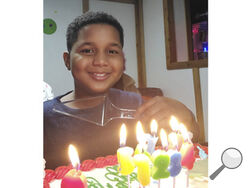 Ahmir Jolliff, who was killed in a school shooting on Thursday, Jan. 4, 2024, in Perry, Iowa, poses at one of his birthday parties in this undated photo provided by his mother. He was 11 years old and a sixth grader when he died. Authorities say a 17-year-old opened fire in the cafeteria of Perry High School before classes began for the day, killing Ahmir and wounding seven other people. The teenage suspect died of a self-inflicted gunshot wound. (Erica Jolliff via AP)