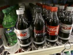  This Wednesday, Oct. 1, 2014, file photo, shows soft drinks for sale at K & D Market in San Francisco. (AP Photo/Jeff Chiu, File)