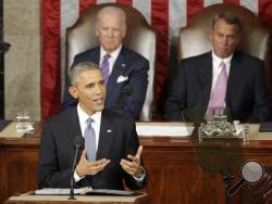 In this Jan. 20, 2015, file photo, President Barack Obama gives his State of the Union address before a joint session of Congress on Capitol Hill in Washington as Vice Presient Joe Biden and House Speaker John Boehner listen. (AP Photo/J. Scott Applewhite, File)