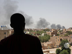 Smoke is seen in Khartoum, Sudan, Saturday, April 22, 2023. The fighting in the capital between the Sudanese Army and Rapid Support Forces resumed after an internationally brokered cease-fire failed. (AP Photo/Marwan Ali)