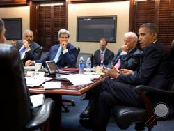 In this image provided by The White House, President Barack Obama meets with his national security staff to discuss the situation in Syria, in the Situation Room of the White House, Friday, Aug. 30, 2013, in Washington, including from left national security adviser Susan Rice; Attorney General Eric Holder, Secretary of State John Kerry, and Vice President Joe Biden. (AP Photo/The White House, Pete Souza)