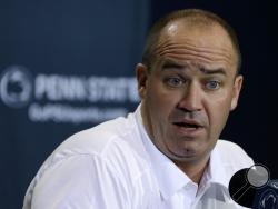 In this Aug. 8, 2013, photo, Penn State coach Bill O'Brien meets with reporters during the NCAA college football team's media day in State College. (AP Photo/Gene J. Puskar)