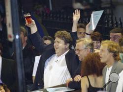  In this May 21, 1993 file photo, members of the television show "Cheers," from left, George Wendt, John Ratzenberger, Rhea Perlman, Woody Harrelson and Kelsey Grammer, toast the crowd outside the Bull and Finch Pub in Boston. "Cheers" is being adapted for the stage riffing on the Bostonian themes and sexual tension that powered the wildly popular '80s TV sitcom. The play is scheduled to debut in September 2016 in Boston before embarking on a national tour. (AP Photo/Charles Krupa, File)
