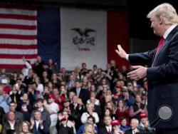 President-elect Donald Trump waves to the crowd during a rally at Hy-Vee Hall, Thursday, Dec. 8, 2016, in Des Moines. (AP Photo/Andrew Harnik)