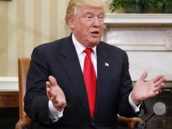 In this Nov. 10, 2016 file photo, President-elect Donald Trump speaks during his meeting with President Barack Obama in the Oval Office of the White House in Washington. The military parade for Donald Trump has come early. Two months before Inauguration Day festivities, an extraordinary number of recently retired generals, including a few who clashed with President Barack Obama’s administration, are marching to the president-elect’s doorstep for job interviews. (AP Photo/Pablo Martinez Monsivais, File)