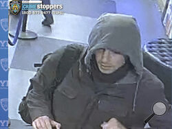 This image provided by the New York City Police Department shows a man wanted for questioning in connection to the investigation of the killing of UnitedHealthcare CEO Brian Thompson outside a Manhattan hotel, Wednesday, Dec. 4, 2024. (New York City Police Department via AP)