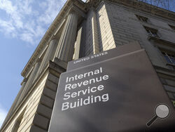 FILE - The exterior of the Internal Revenue Service (IRS) building is seen in Washington, on March 22, 2013. The IRS is promoting the improvements its made to its customer service since its received tens of billions in new funds through Democrats' Inflation Reduction Act. Agency leadership is trying to bring attention to what's been done to repair the agency's image as an outdated and maligned tax collector. Monday, April 15, 2024, is the last day to submit tax returns or to file an extension. (AP Photo/Sus