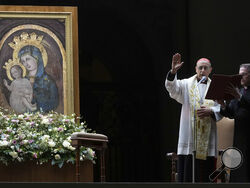 Cardinal Victor Manuel Fernandez, left, prays during a rosary prayer held for the health of Pope Francis in St Peter's Square at The Vatican, Friday, Feb. 28, 2025. (AP Photo/Kirsty Wigglesworth)
