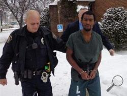 Wilkes-Barre police and Luzerne County Detectives escort Lamar Curry-Davis from magisterial district court. (Ed Lewis/The Times Leader)