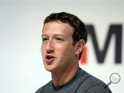 In this March 2, 2015 file photo, Facebook CEO Mark Zuckerberg speaks during a conference at the Mobile World Congress, the world's largest mobile phone trade show in Barcelona, Spain. (AP Photo/Manu Fernandez, File)