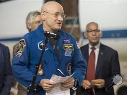 Expedition 46 Commander Scott Kelly of NASA delivers remarks upon arriving at Ellington Field, Thursday, March 3, 2016 in Houston, Texas, after his return to Earth. (Joel Kowsky/NASA via AP)