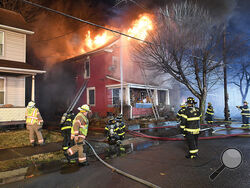 Berwick firefighters battle this blaze in the 300 block of East Second Street in the borough early Friday morning. (Press Enterprise/Keith Haupt)
