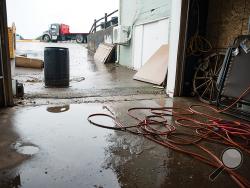 Press Enterprise/ Blake Nissen Water filled the basement of Jingle Hall in Berwick during a storm on Wednesday afternoon. Flooding at the facility and Crispin Field caused the fireworks to be delayed until Friday.