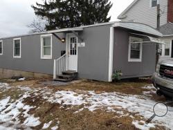 Bloomsburg police are investigating why gunshots were fired early Friday outside this student rental along Pine Street, near Bloomsburg Care and Rehabilitation Center. No one was hurt and police are searching for a suspect. (Press Enterprise/Leon Bogdan)