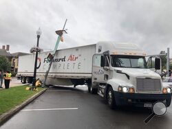 A tractor trailer sits at the intersection of East Street and Main Street after knocking down a traffic light as it tried to turn onto College Hill. (Press Enterprise/M.J. Mahon)