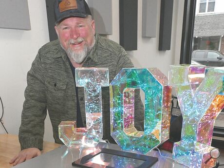 Gregory Martz, founder of CoStream, Berwick, is offering a challenge to computer hackers: If they make the lights of this sign — controlled by one of his company's water and sewer monitoring controllers — flash three times, they win $5,000.