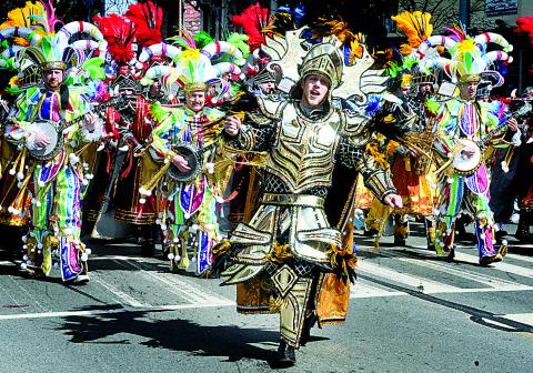 Members of the Woodland String Band of Philadelphia strut down Main Street during the Columbia County Bicentennial parade in Bloomsburg on Saturday afternoon.