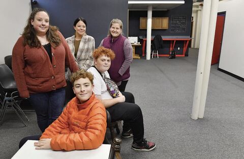 Shown in the new space for the For the Cause Teen Center in Bloomsburg are, from left, seated, Oscar Schell-McGaw, board member; and Milo Schell-McGaw, board secretary. Standing are Danielle Pearson, Teen Center director; Teresa Peters, For the Cause regional director; and Adrienne Mael, president/CEO, Susquehanna Valley United Way. The spot is to open next month at 36 E. Main St. in Bloomsburg