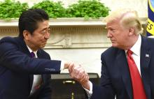 President Donald Trump shakes hands with Japanese Prime Minister Shinzo Abe in the Oval Office of the White House in Washington, Thursday, June 7, 2018. (AP Photo/Susan Walsh)