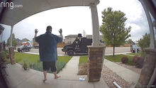 In this image from video provided by Leslie Bowman, Anderson Lee Aldrich surrenders to police at a home where his mother, Laura Voepel, was renting a room in Colorado Springs, Colo., on June 18, 2021. According to sealed law enforcement documents verified by The Associated Press, Aldrich's actions brought SWAT teams and the bomb squad to the normally quiet neighborhood, forced the grandparents to flee for their lives and prompted the evacuation of 10 nearby homes to escape a possible bomb blast. (Leslie Bow