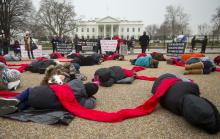 Anti-abortion activists stage a "die-in" in front of the White House in Washington on Wednesday, Jan. 21, 2015. (AP Photo/Pablo Martinez Monsivais)