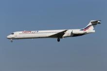 This photo taken on Friday, May 16, 2014 shows an MD-83 aircraft in the livery of Swiftair landing at Zaventem Airport Brussels. An Air Algerie flight carrying over 100 people from Burkina Faso to Algeria's capital disappeared from radar early Thursday over northern Mali after heavy rains were reported, according to the plane's owner and government officials in France and Burkina Faso. AP Photo/Kevin Cleynhens)