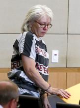 In this Aug. 1, 2013, file photo, Debra Jean Milke, convicted in the 1989 shooting death of her 4-year-old son for an insurance payout, arrives for a hearing at Maricopa County Superior Court in Phoenix. Milke, who has spent more than two decades on death row, is expected to be released on Friday, Sept. 6, 2013, while she awaits a retrial of her case. 